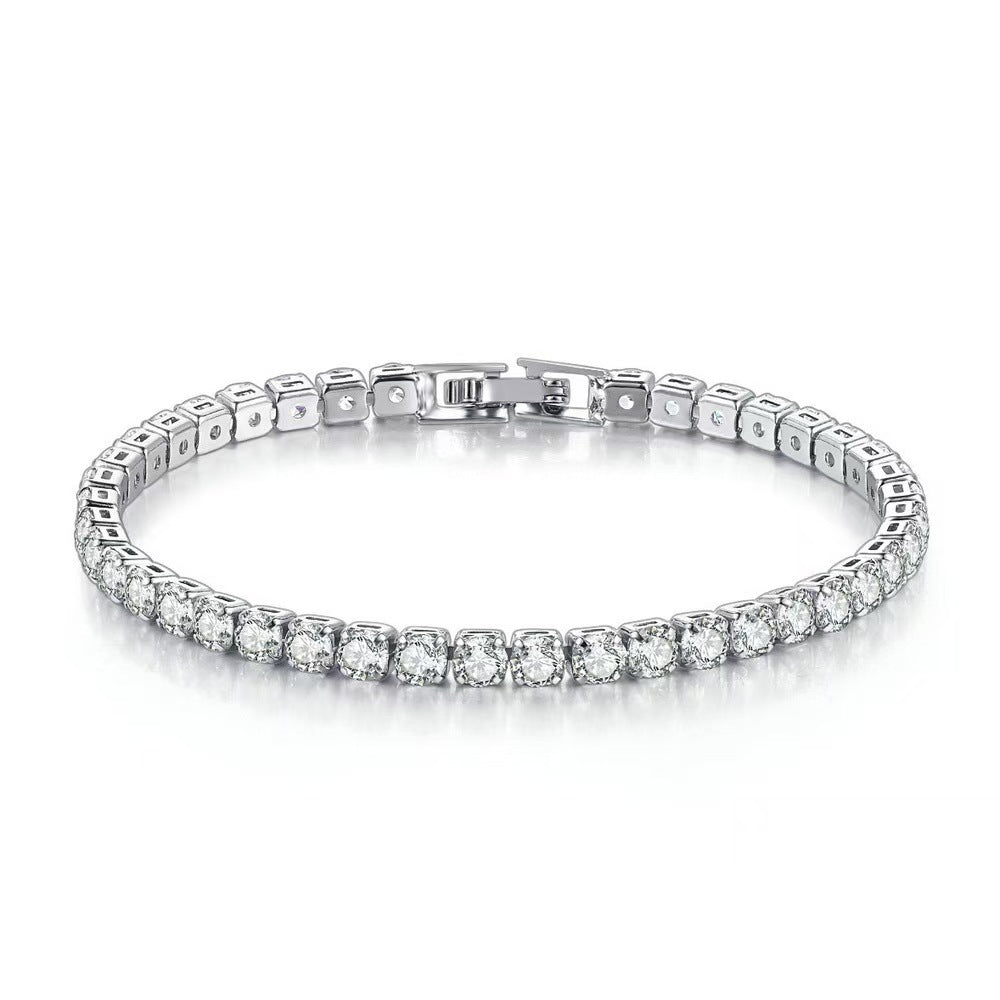 Luxury titanium steel tennis bracelet with brilliant zirconia stones in square settings and a secure box clasp, isolated on a white background.