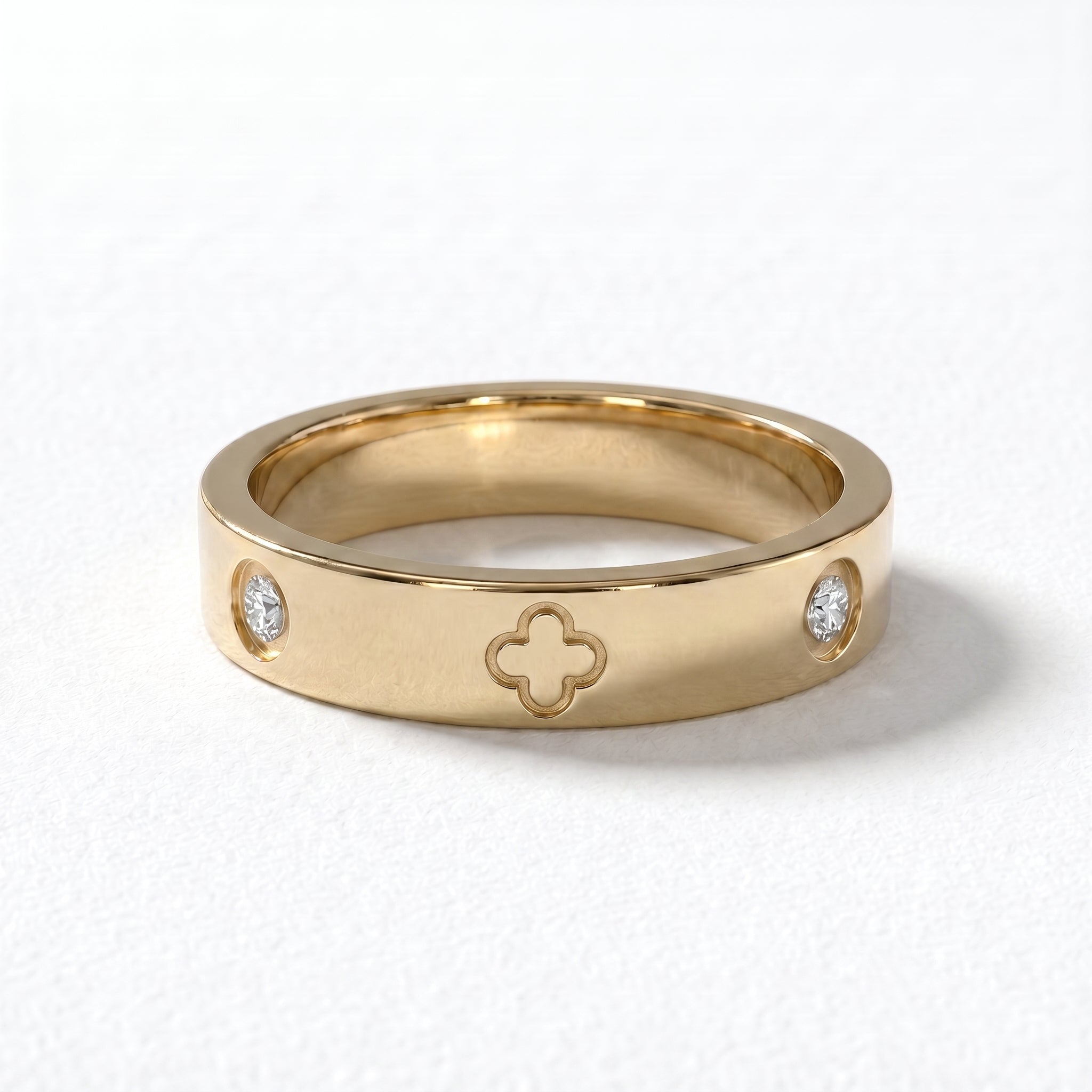 Studio shot of the exquisite 18K gold clover diamond ring, highlighting the brilliant-cut diamonds and intricate four-leaf clover design on a pristine white background.