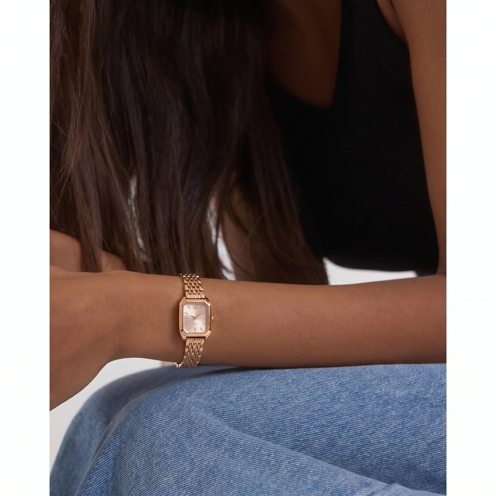 Gold-tone Radian Square Watch worn on a woman's wrist, showcasing elegant fit and everyday style