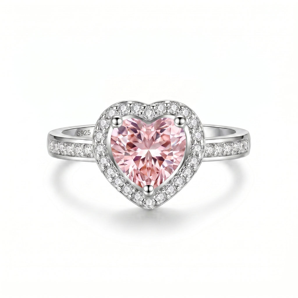 Elegant S925 Sterling Silver adjustable heart halo ring showcasing a delicate heart-cut simulated pink sapphire gemstone encircled by sparkling pavé simulated diamonds.
