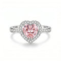 Elegant S925 Sterling Silver adjustable heart halo ring showcasing a delicate heart-cut simulated pink sapphire gemstone encircled by sparkling pavé simulated diamonds.