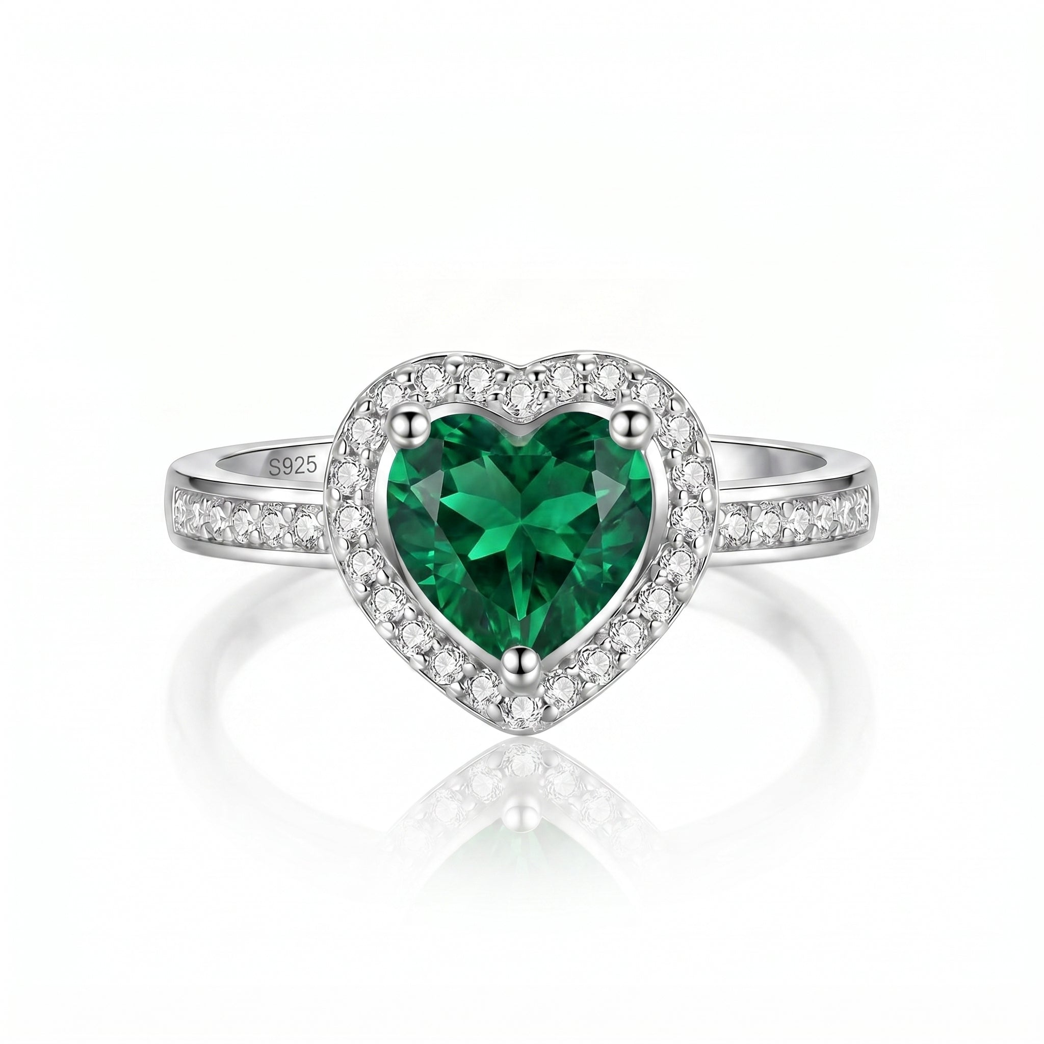Vibrant S925 Sterling Silver adjustable heart halo ring adorned with a captivating heart-cut simulated emerald gemstone framed by brilliant pavé simulated diamonds.