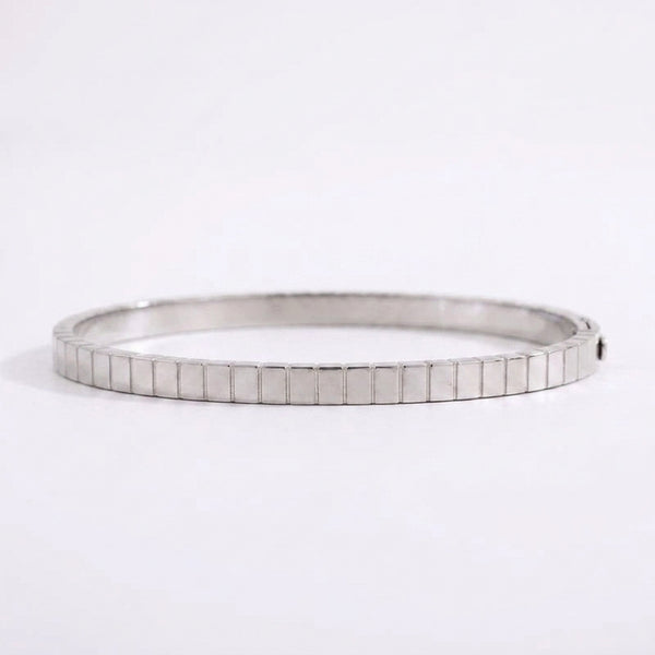 Modern silver titanium steel electroplated bracelet, a waterproof and affordable jewelry piece with a unique geometric design.
