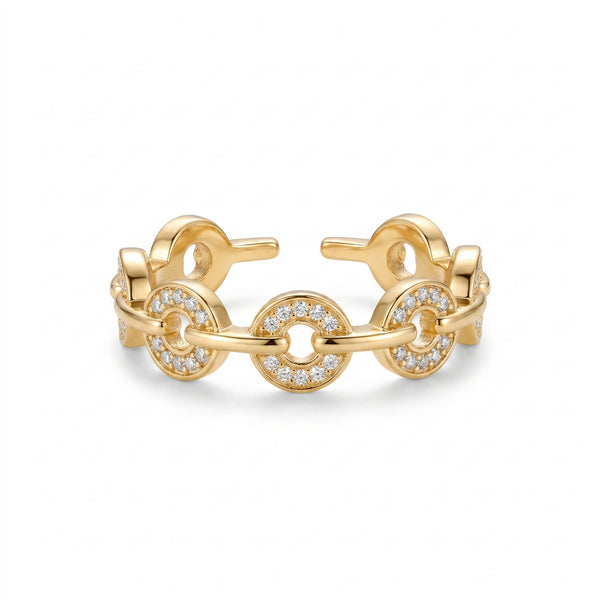 Detailed close-up of the gold-plated Pavé Link Ring featuring brilliant pavé zirconia on circular links and an adjustable open band, set against a pristine white background.