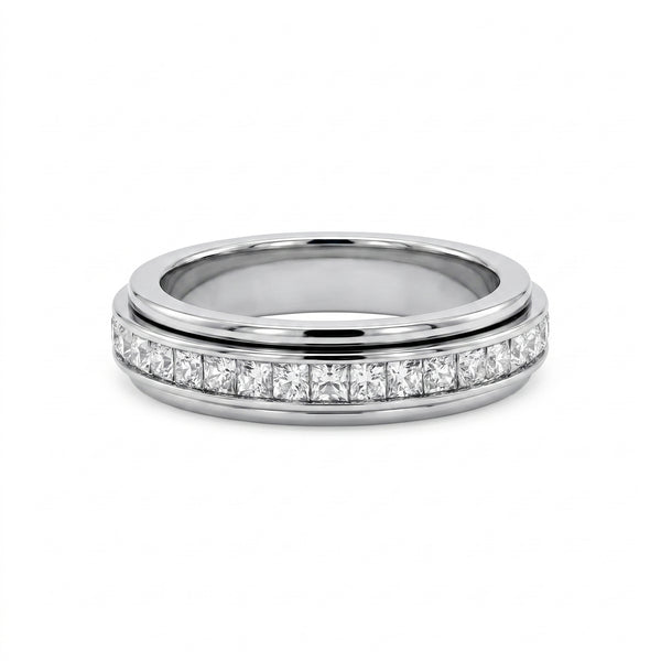 Close-up studio shot of a luxurious white gold motion band, adorned with a rotating row of sparkling princess-cut diamonds.