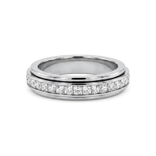 Close-up studio shot of a luxurious white gold motion band, adorned with a rotating row of sparkling princess-cut diamonds.