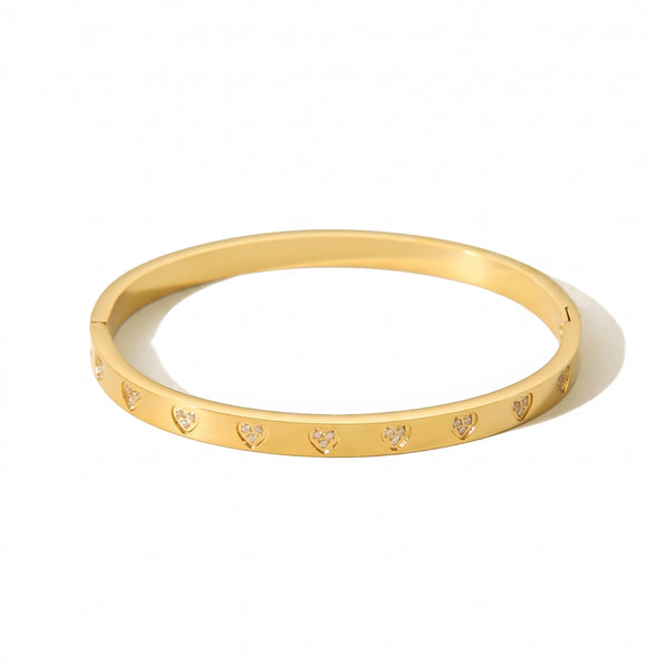 Waterproof stainless steel bracelet with zircon heart details on white background