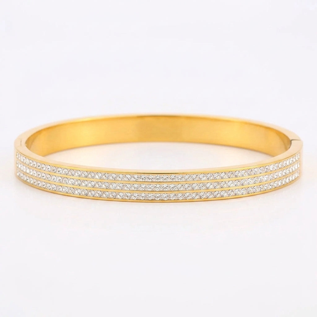 Waterproof gold-plated titanium steel zircon bangle, a luxurious yet affordable jewelry piece with sparkling zircons.