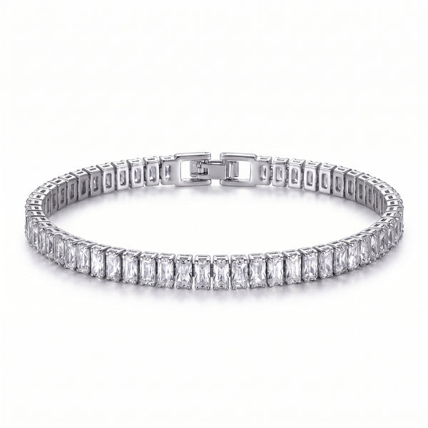 Close-up of a platinum-plated tennis bracelet with brilliant baguette-cut zircon stones and a secure box clasp, against a white background.